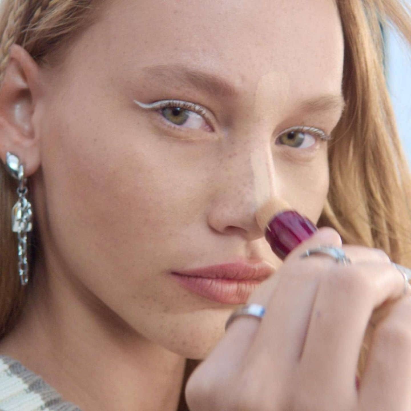 How to Apply Liquid Matte Lipstick model with purple lips