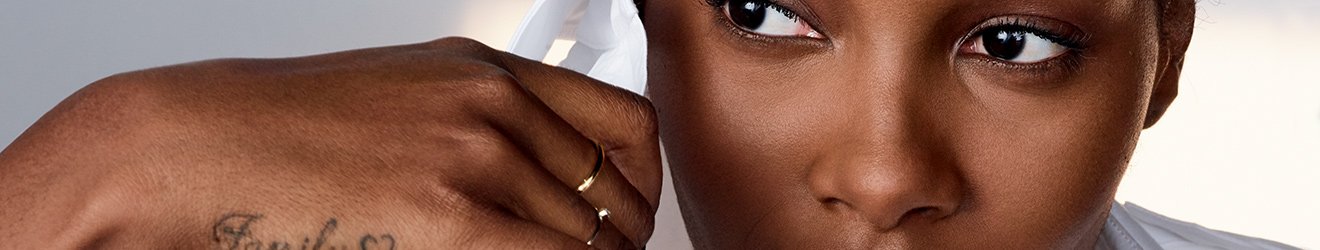 Maybelline Face Makeup products illustrative banner image - Close up of two blond models