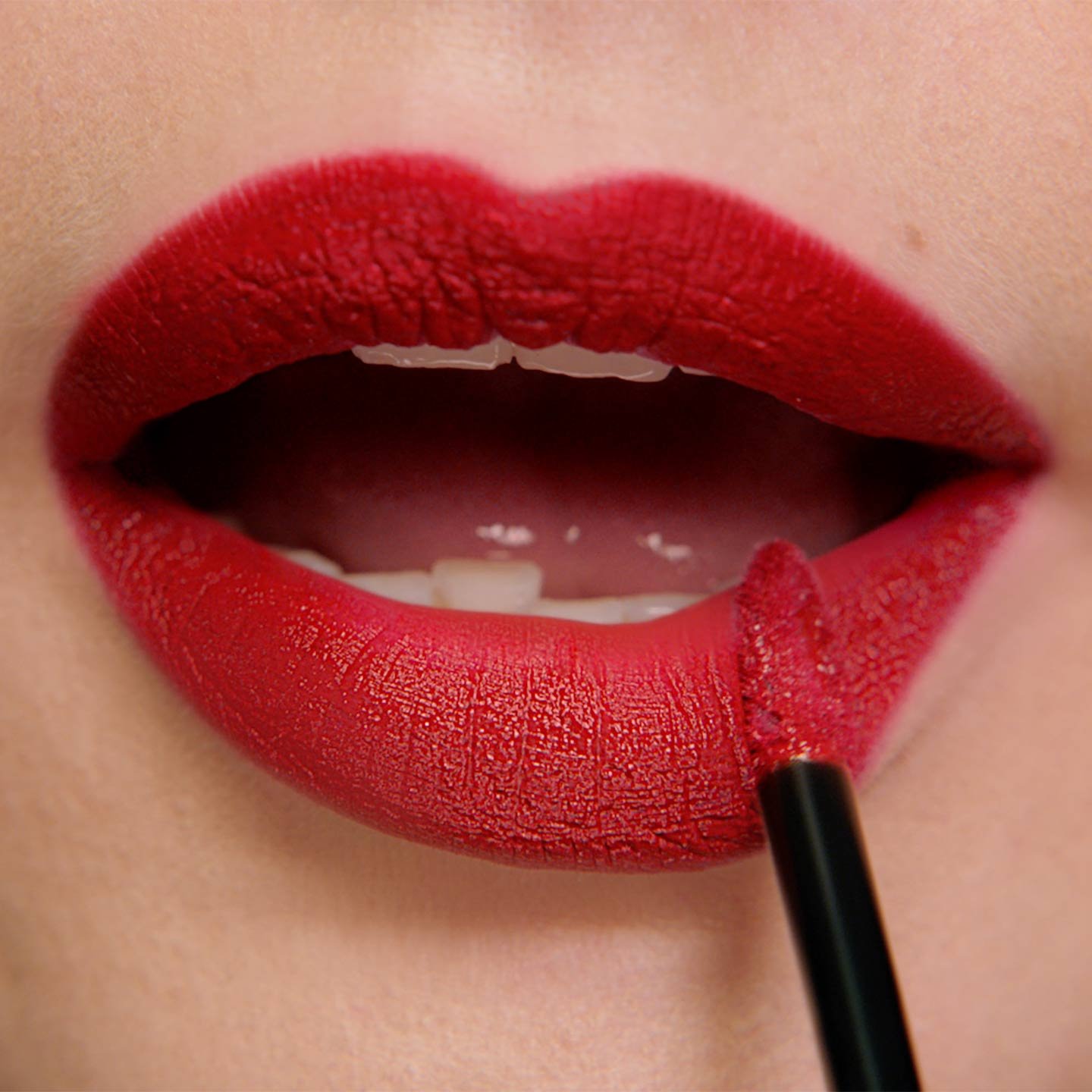 How to Apply Liquid Matte Lipstick model with purple lips