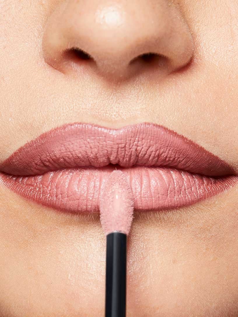 How to Apply Liquid Matte Lipstick model with purple lips